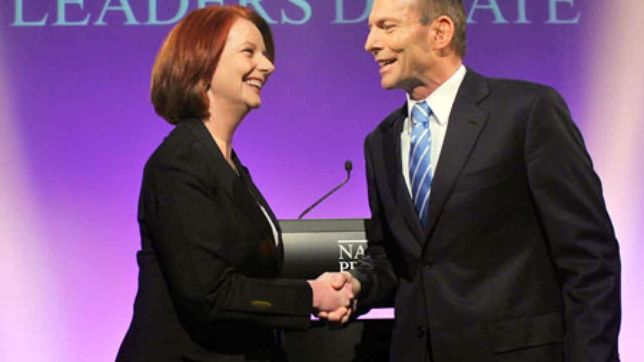 Election_debate_Abbott_Gilard_100725_B_aap_517840129