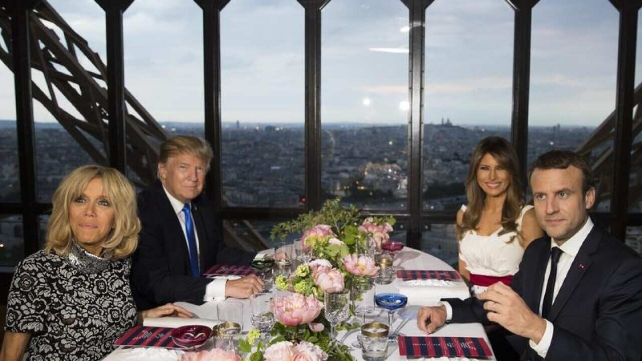 The US and French leaders attend a dinner at the Eiffel Tower