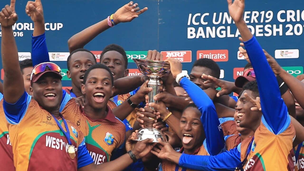 West Indies players celebrate.