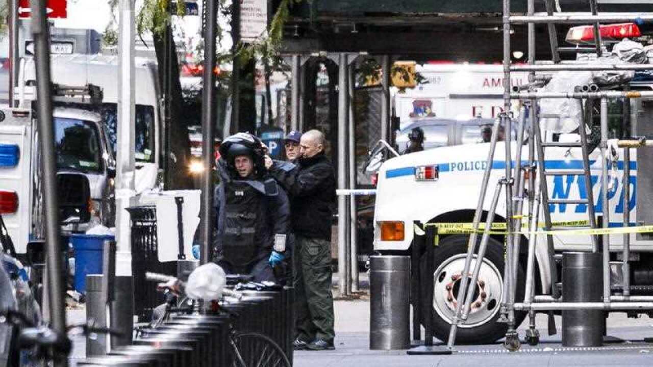 The NYPD Bomb Squad outside the CNN building as officers secure the broadcaster's office, following the discovery of a possible bomb.