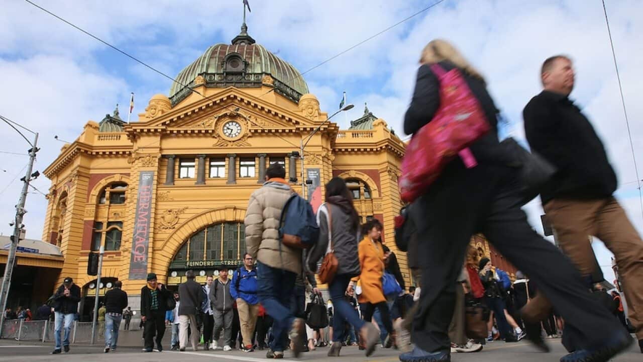 A crowd outside Melbourne's Flinders Street Station.
