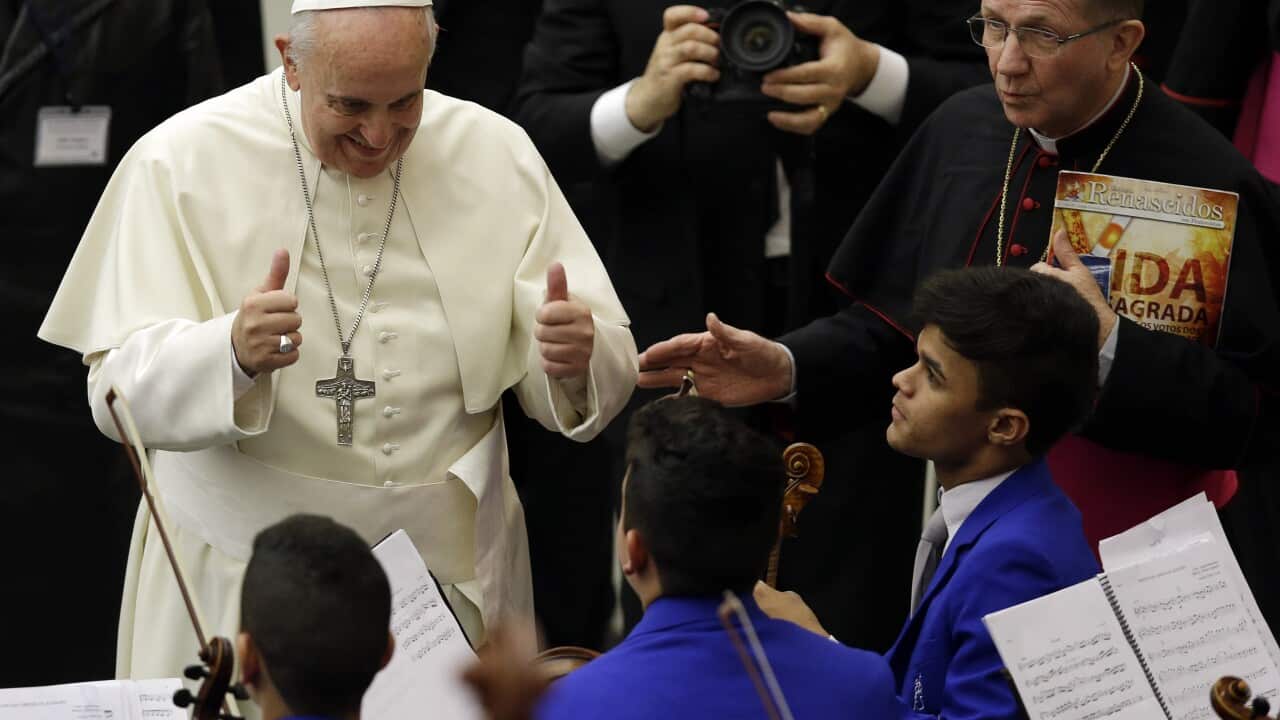 Pope Francis greets a youth orchestra during an audience with members of "Catholic Fraternity of Charismatic Covenant Communities and Fellowships" (AAP)
