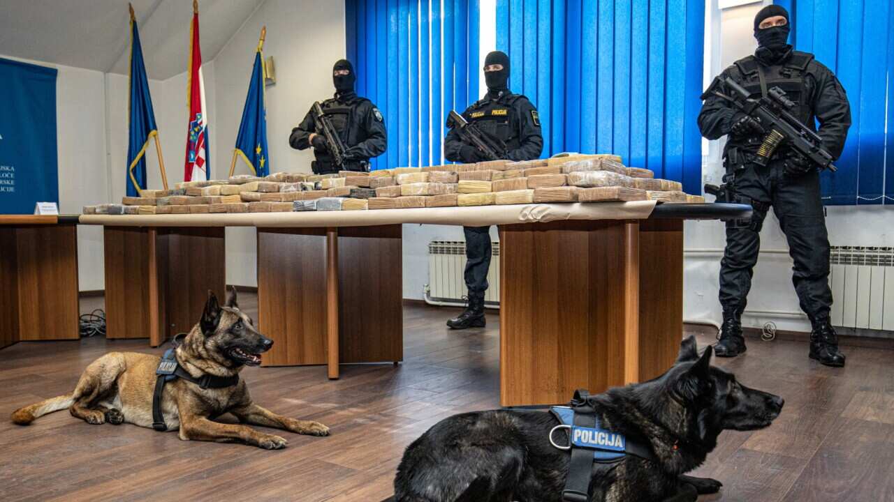 Croatian special police agents guard bags of cocaine during a news conference in Dubrovnik, Croatia, on April 14, 2021.
