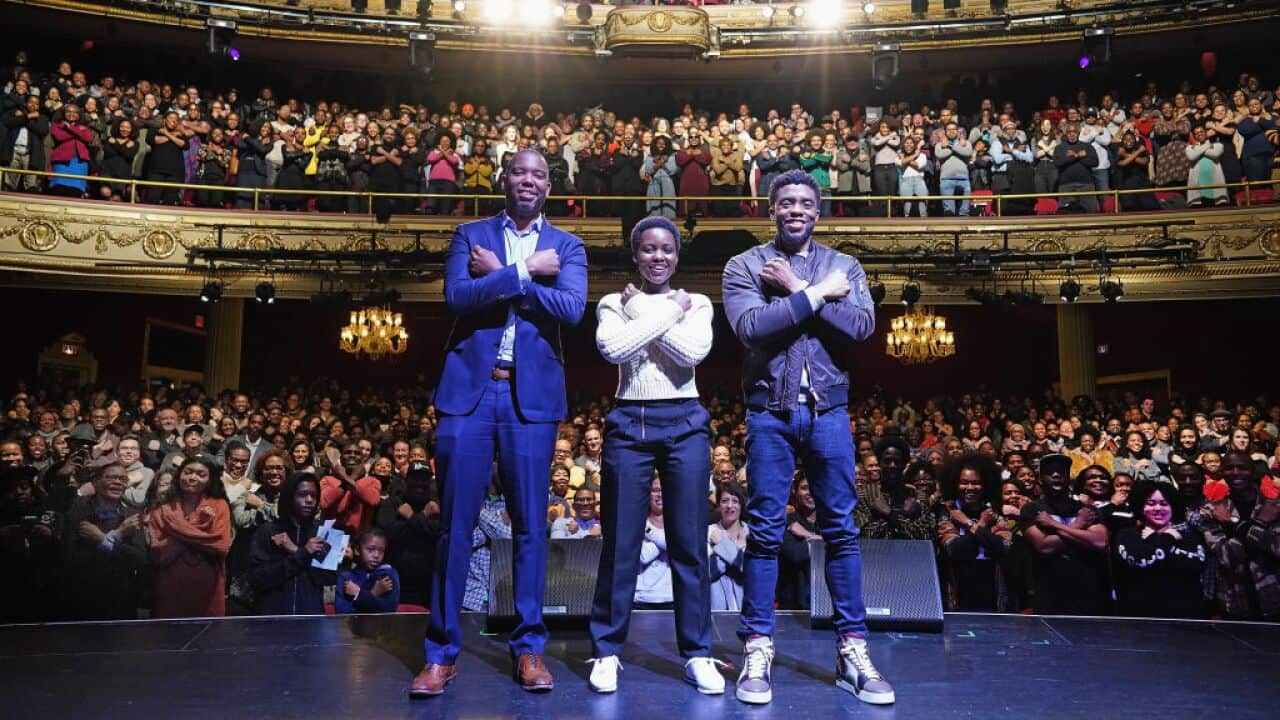 Author Ta-Nehisi Coates with Black Panther stars Chadwick Boseman, Lupita Nyong'o at The Apollo Theater on February 27, 2018 in New York City.