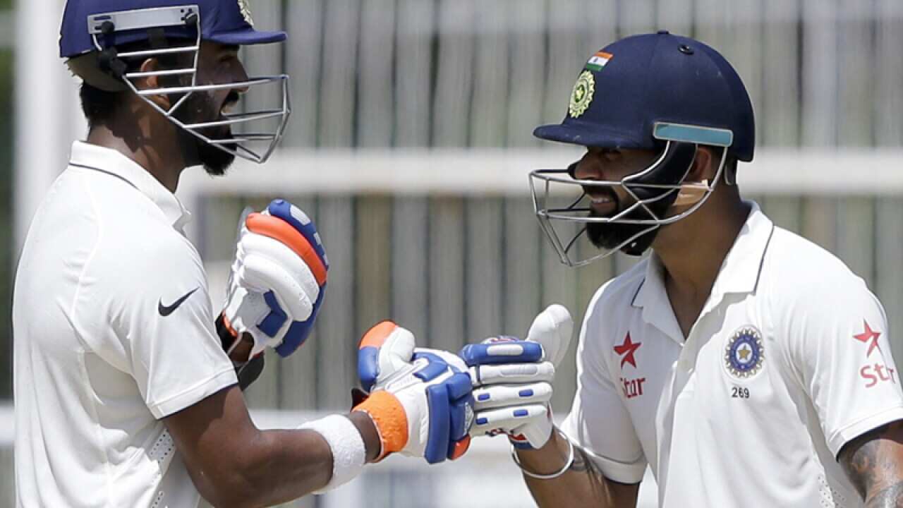 Indian batsmen Lokesh Rahul (L) and Virat Kohli