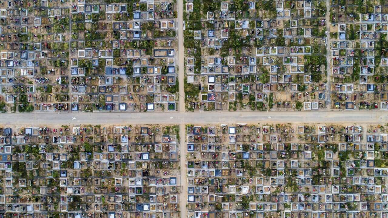 Fresh graves at Butovskoye cemetery, outside Moscow, Russia