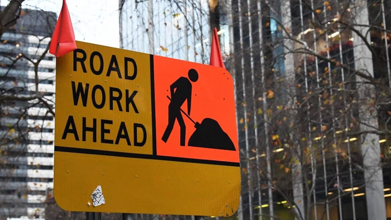 A road work sign is seen in Melbourne's CBD on Monday, July 8, 2018. (AAP Image/James Ross) NO ARCHIVING