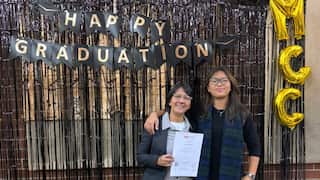 Nirmala Nadia with her son, Matajiwa Innaddin Yahya, on her graduation day at Canterbury City Community College, after completing a Certificate III in Individual Support (Ageing and Disability) through Macquarie Community College.