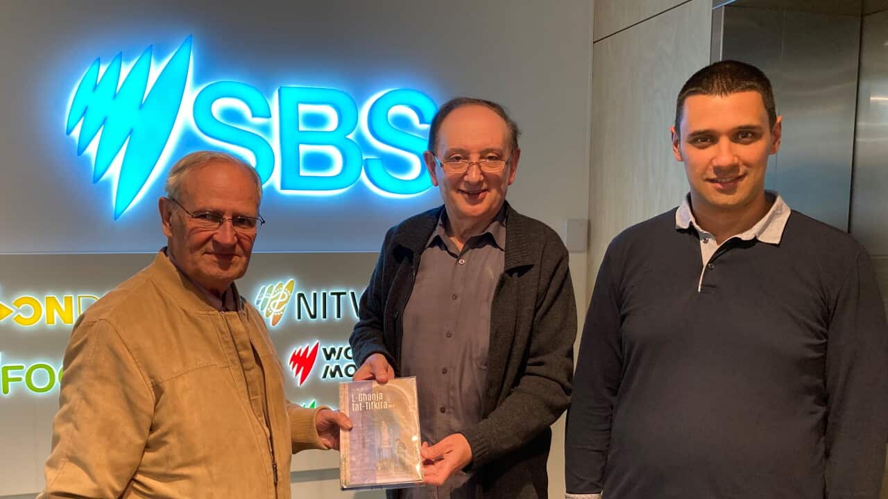 Joe M Attard presenting a copy of his book to J Axiaq with Francesco Pio 2.jpg