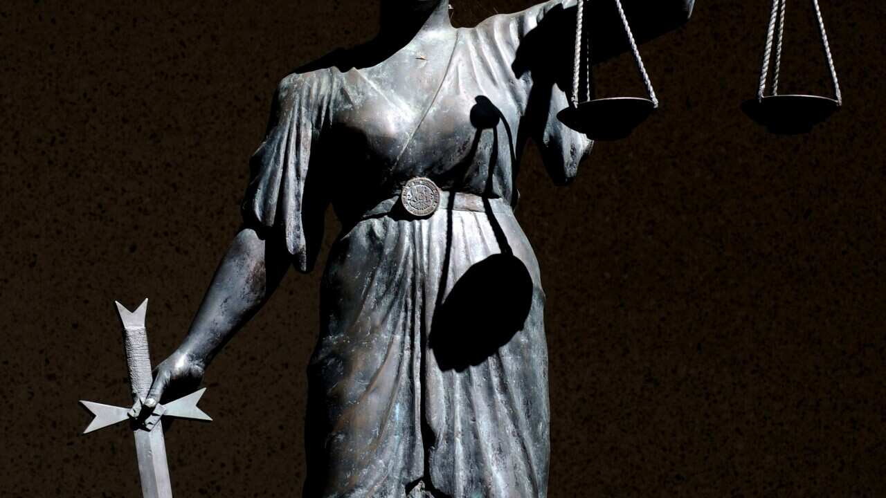 a statue of Themis, the Greek God of Justice, outside the Supreme Court in Brisbane aap.jpg