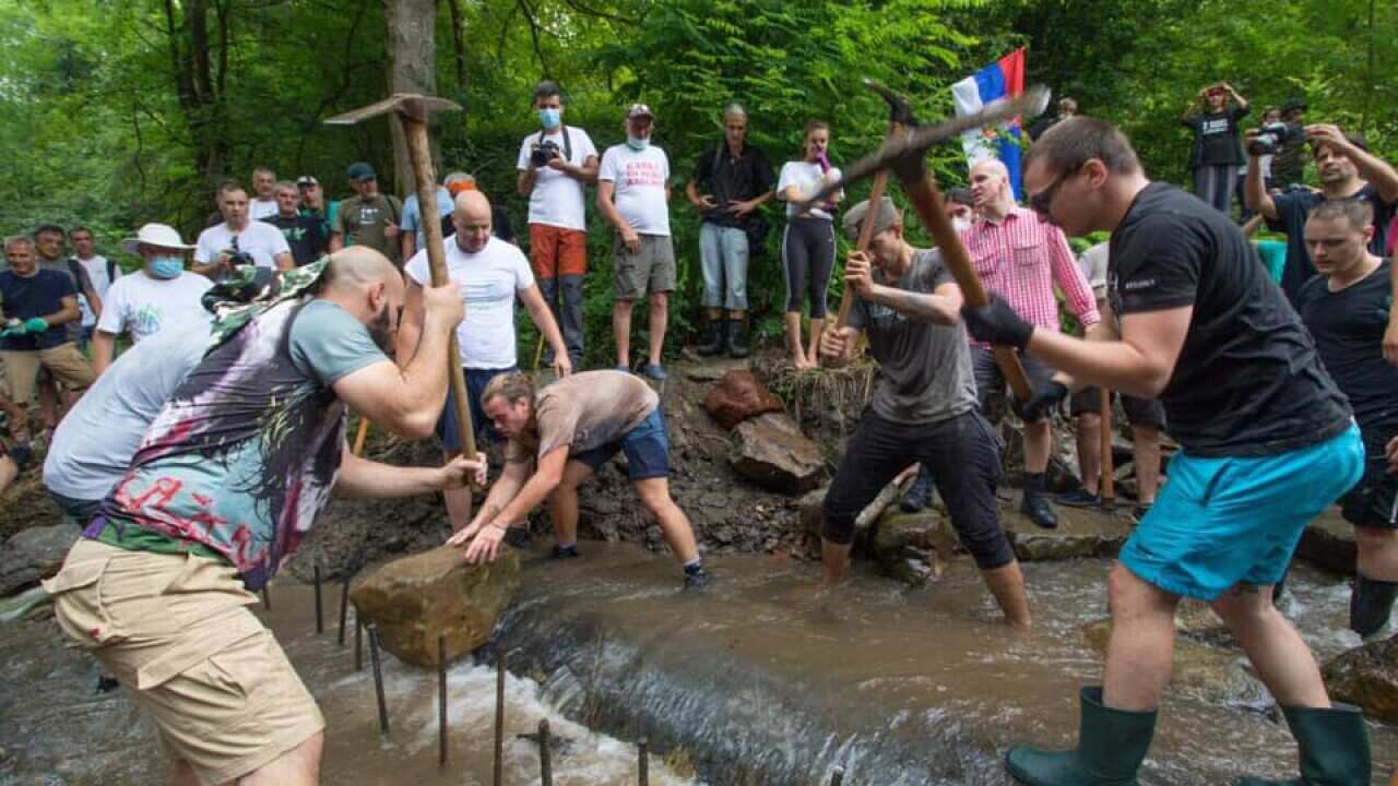 Locals and activist disable a pipe for an unlawful mini-hydro in Rakita, Southeastern Serbia, August 2020