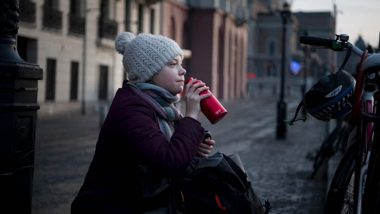Greta Thunberg on her way to a demonstration calling for climate action at the Swedish Parliament in Stockholm.