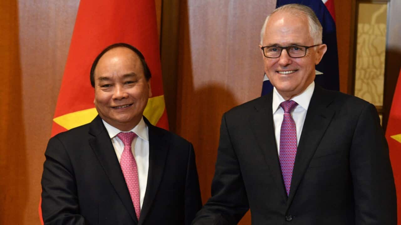 Vietnam's Prime Minister Nguyen Xuan Phuc and Australia's Prime Minister Malcolm Turnbull at a signing ceremony at Parliament House in Canberra, Thursday, March 15, 2018. (AAP Image/Mick Tsikas) NO ARCHIVING