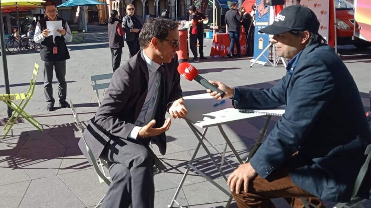 Labor candidate for banks, Chris Gambian, is interviewed by SBS Nepali (SBS)