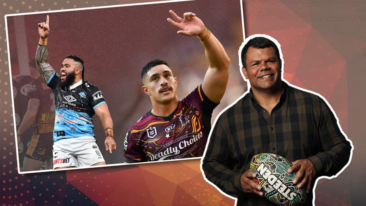 dean widders in front holding a football Kotoni staggs and Siosifa talakai raising their hands,