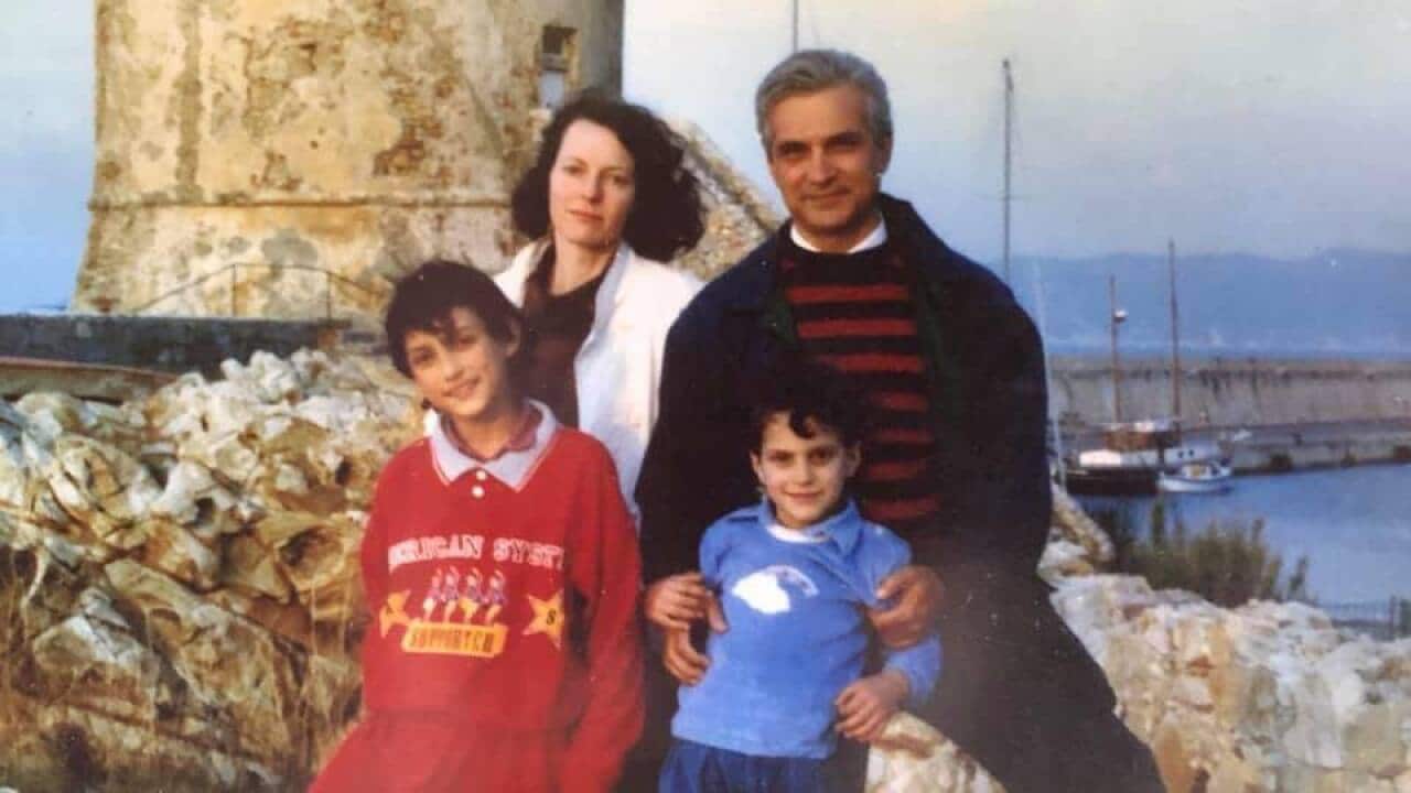 Francesco Raco with his wife and their children