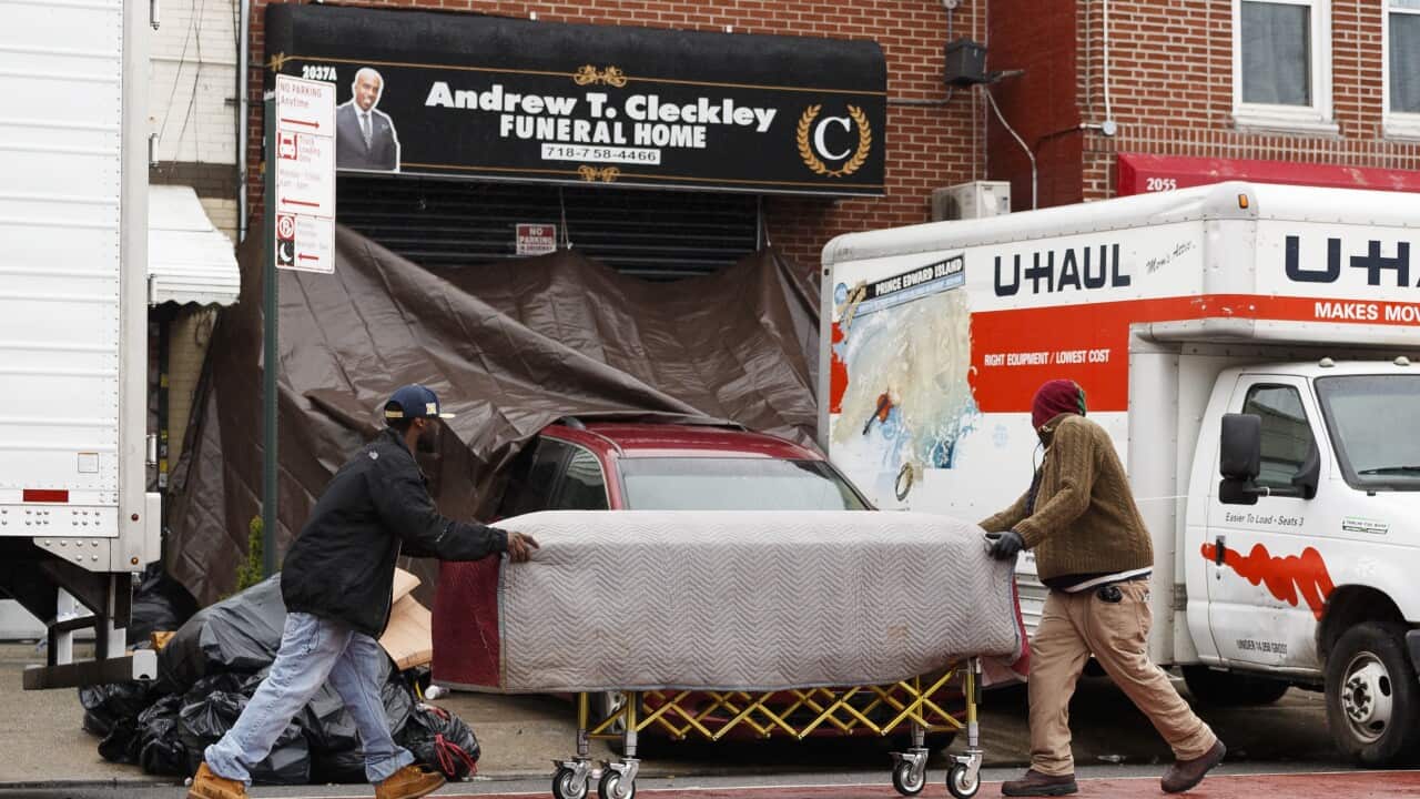 A casket is delivered to the Andrew T Cleckley Funeral Home in Brooklyn, New York.