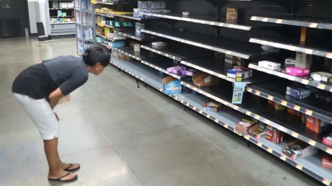 Anxiety over the spread of the virus prompted a run on staple foods such as rice, sugar, coffee, baby formula. (AFP pic)