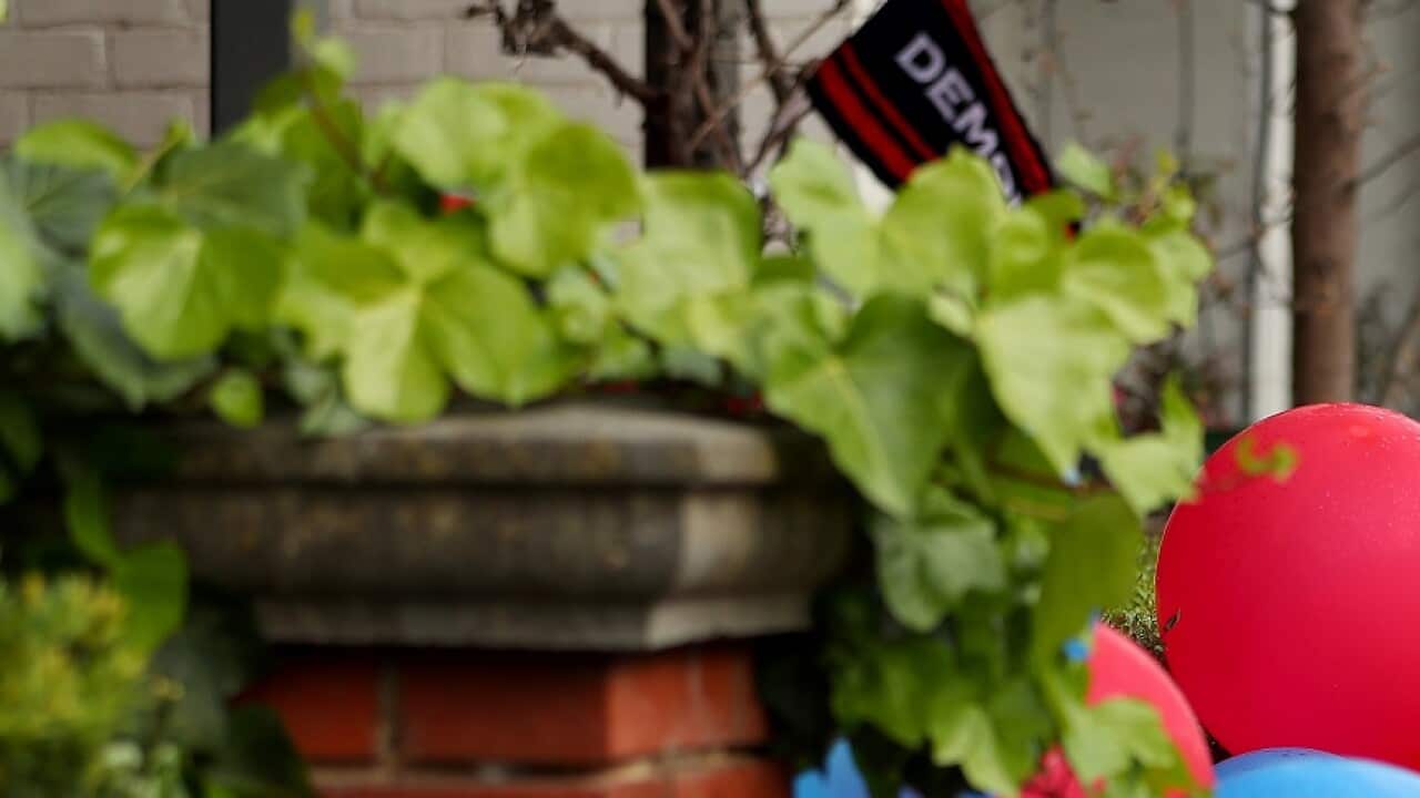Football Fans in Melbourne Watch The AFL Grand Final