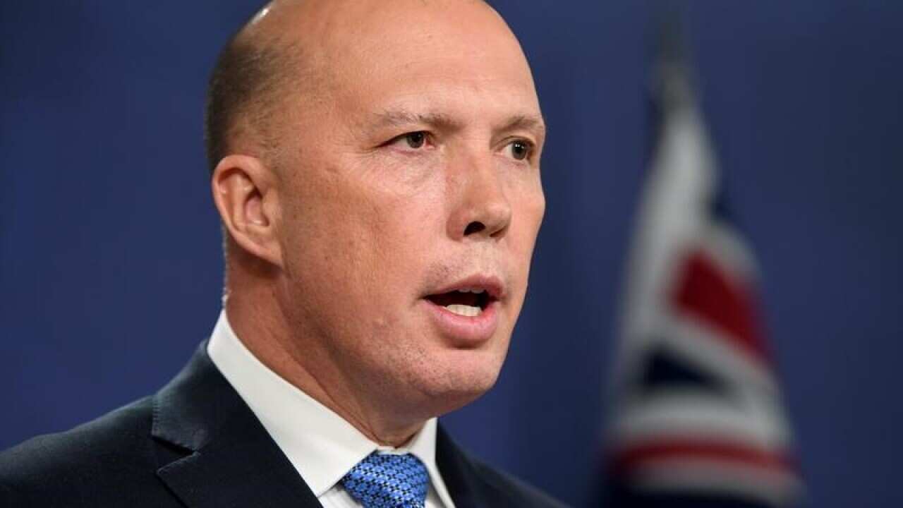 Peter Dutton won't back down on the encryption bill.