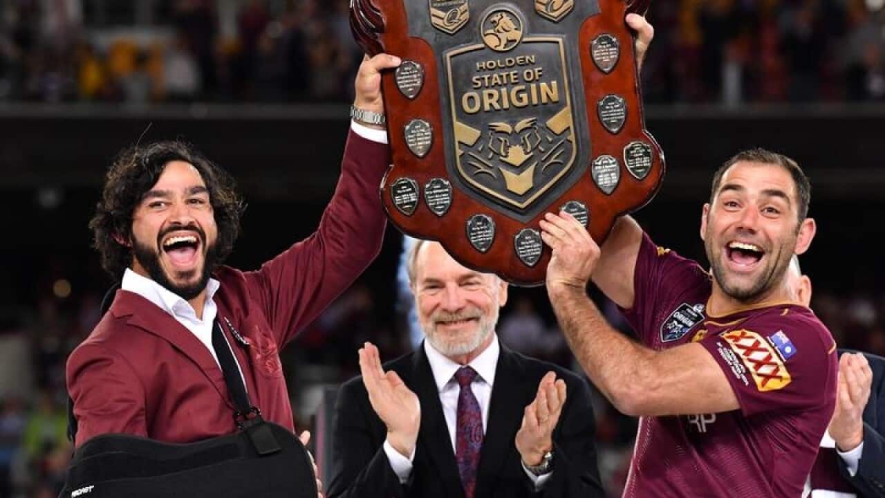 Johnathan Thurston, left, and Cameron Smith.