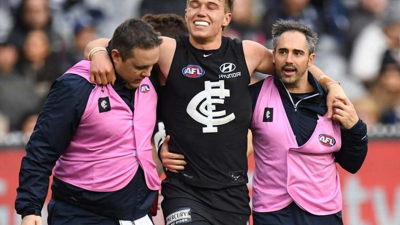 Patrick Cripps of the Blues after sustaining an injury