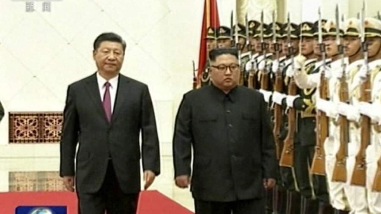 Chinese President Xi Jinping with North Korean leader Kim Jong-un