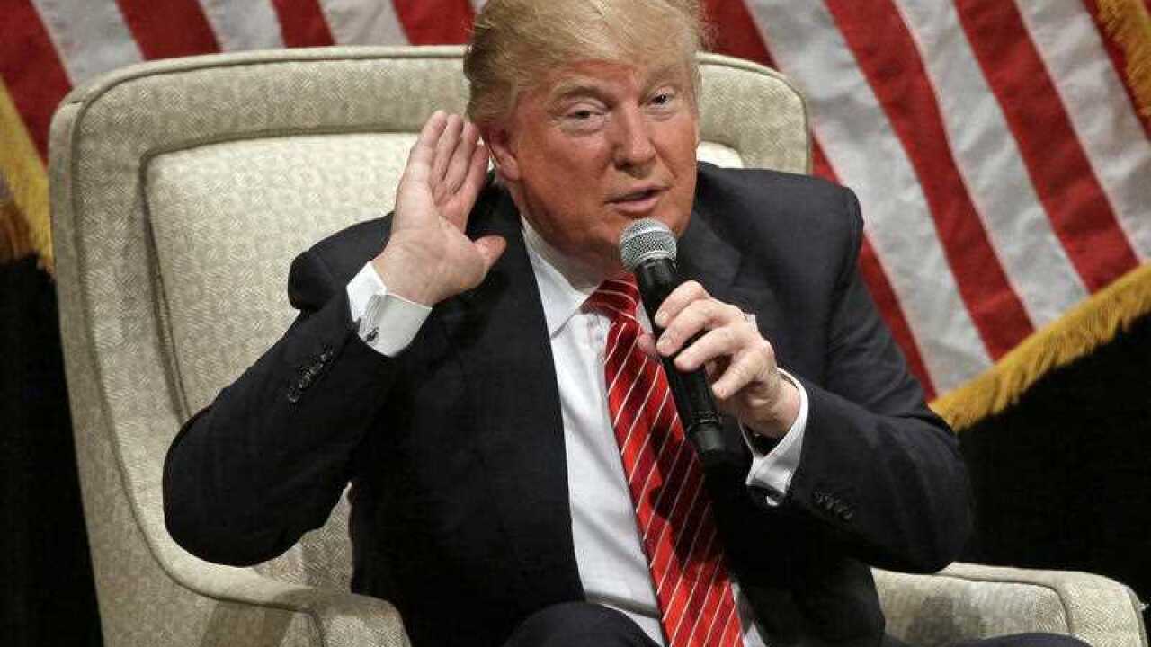 Republican presidential candidate Donald Trump gestures as he speaks at a rally at Lenoir-Rhyne University in Hickory, N.C., Monday, March 14, 2016.