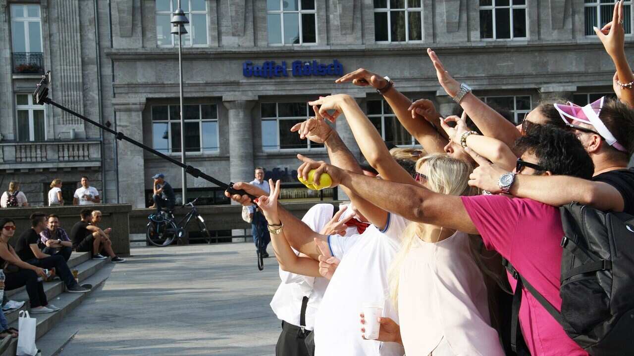 Selfie stick tourists