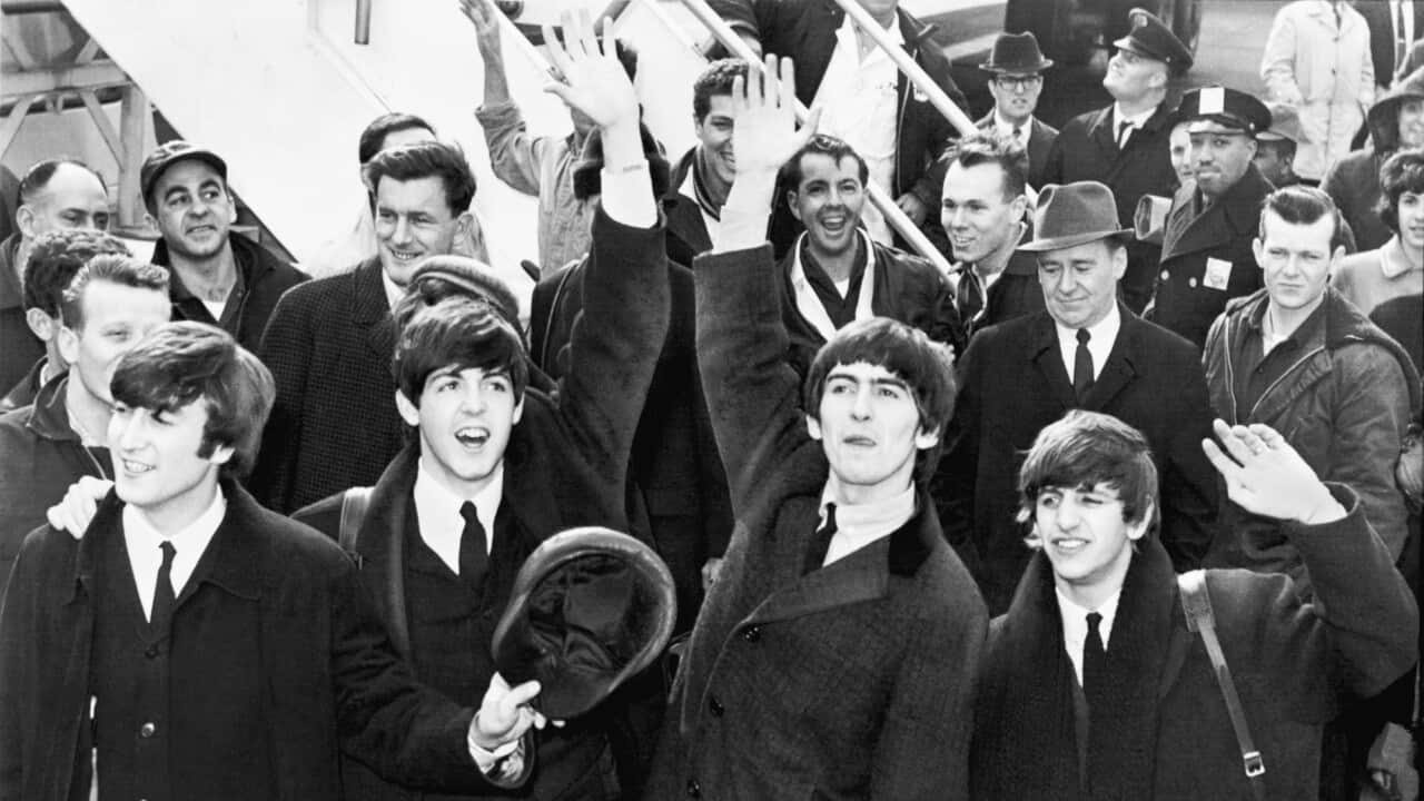The_Beatles_arrive_at_JFK_Airport.jpg