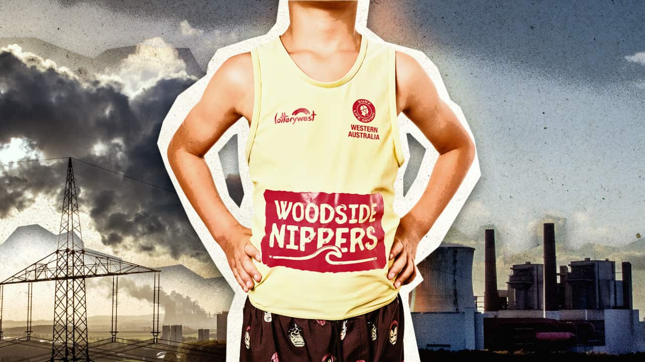 A boy sponsored by Woodside in a yellow singlet stands in front of a skyline with burning fossil fuels