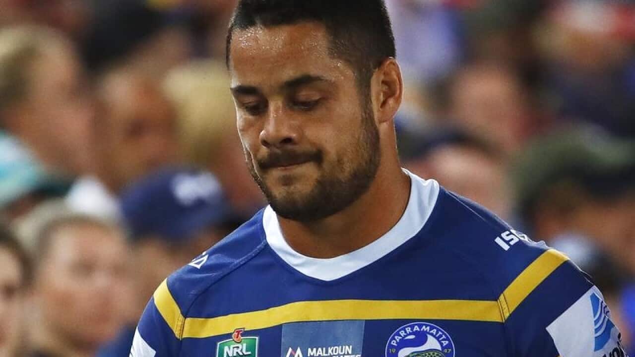 Jarryd Hayne of the Eels leaves the field injured.
