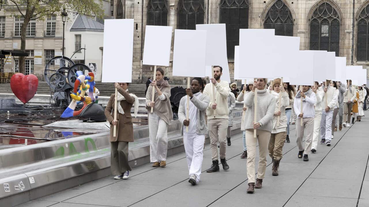 The blank placard dance.