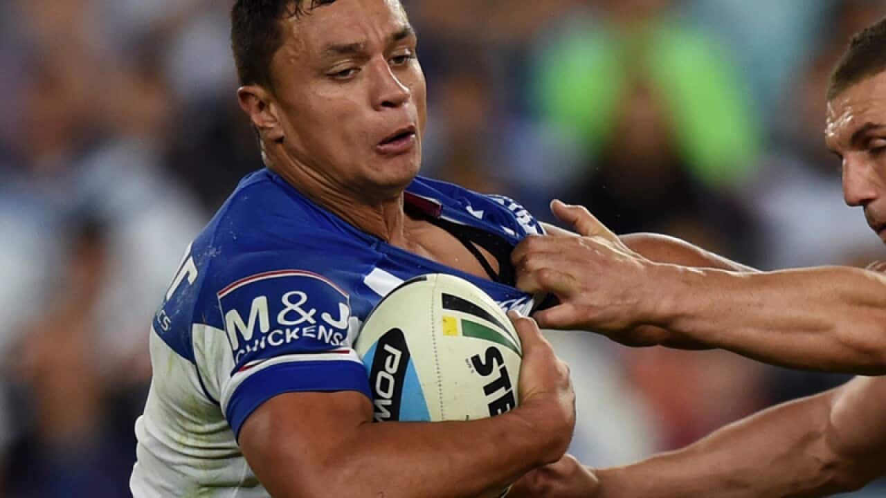 Sam Perrett (left) of the Bulldogs