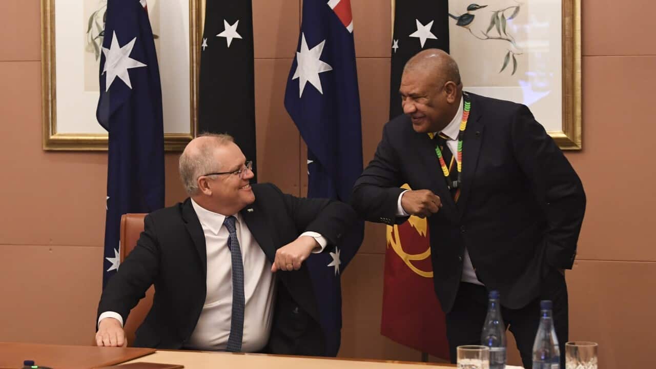 Australian Prime Minister Scott Morrison (left) and Prime Minister of Papua New Guinea James Marape in Canberra, 5 August 2020.