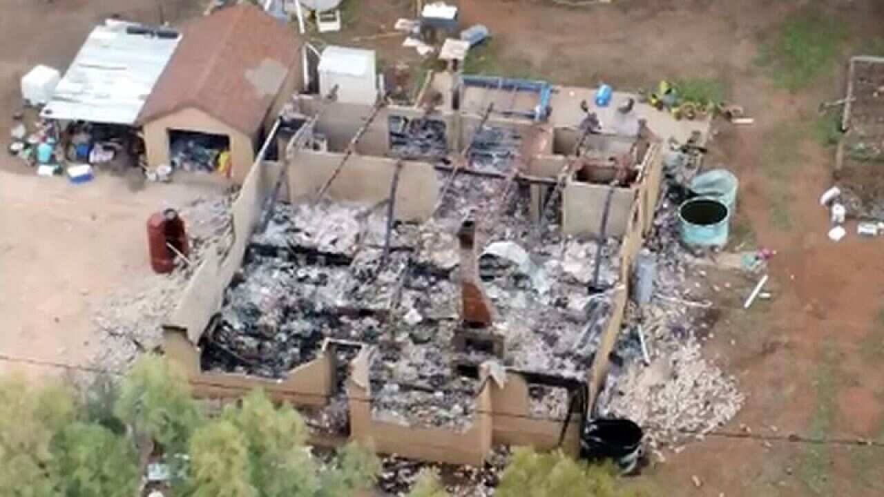 Two women and two boys were allegedly kidnapped after a home in Ootha was burned to the ground.