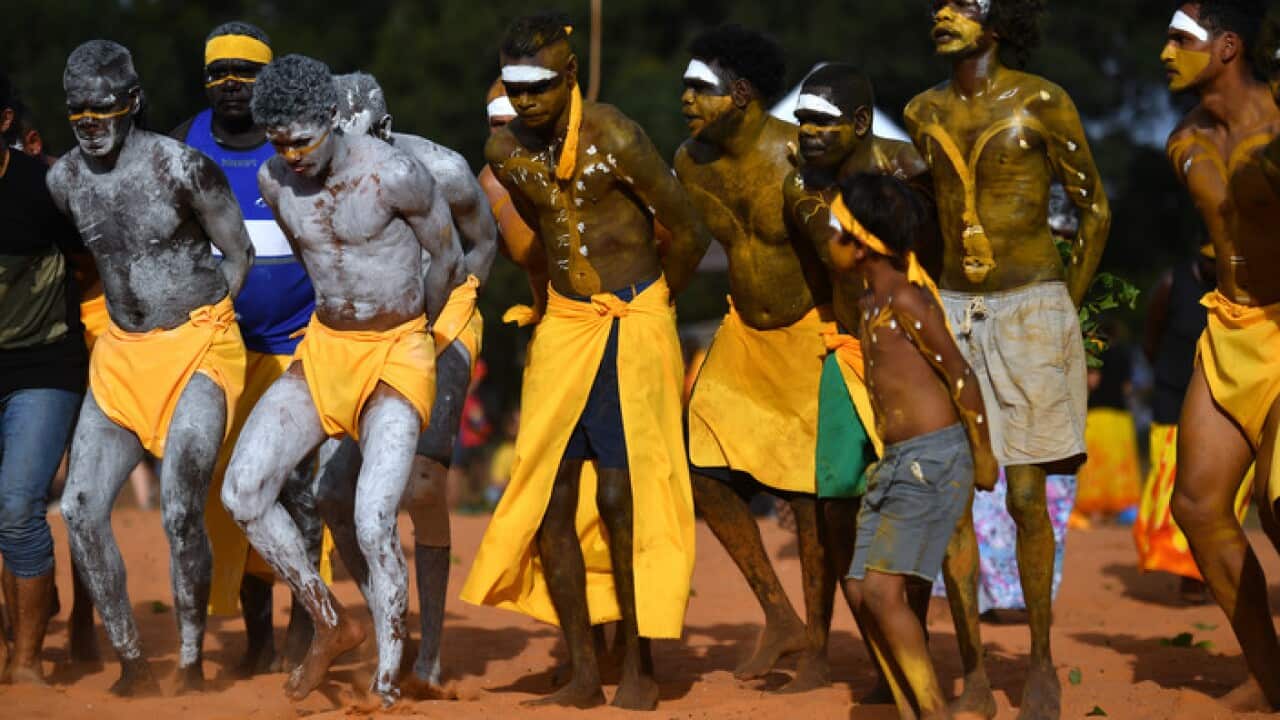 Clan members of the Yolngu people from north-eastern Arnhem Land perform the Bunggul traditional dance during the Garma Festival