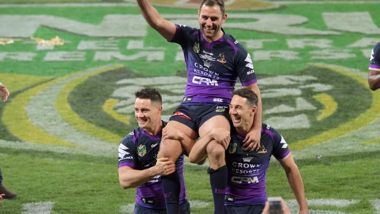 Melbourne Storm's Cooper Cronk (l), Cameron Smith (c) and Billy Slater