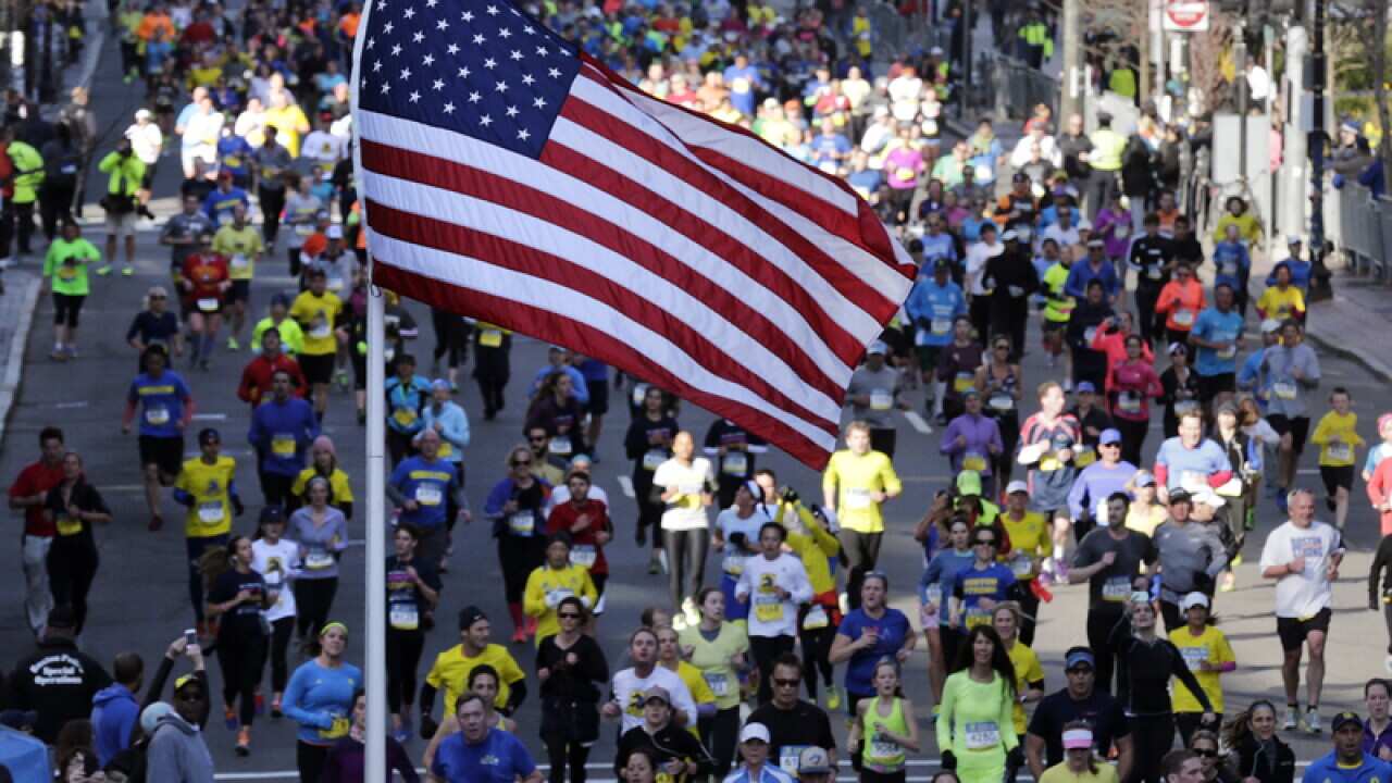 Runners approach the finish line at the 5K Boston Marathon race