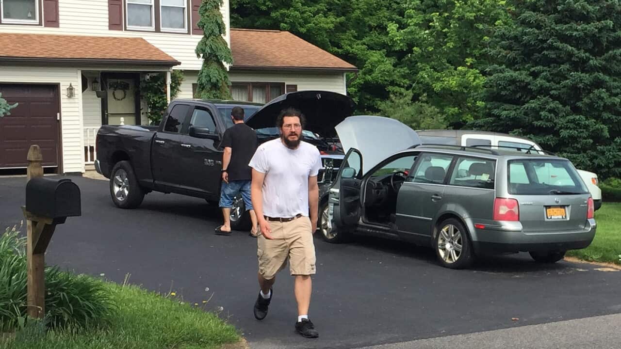 Thirty-year-old Michael Rotondo prepares to leave his parents' house in Camillus, N.Y., Friday, June 1, 2018.