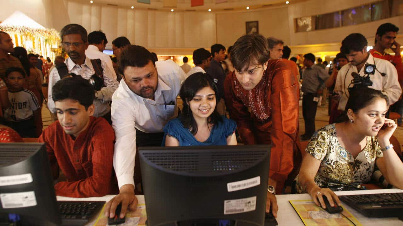 Family members of Indian stock traders in Mumbai