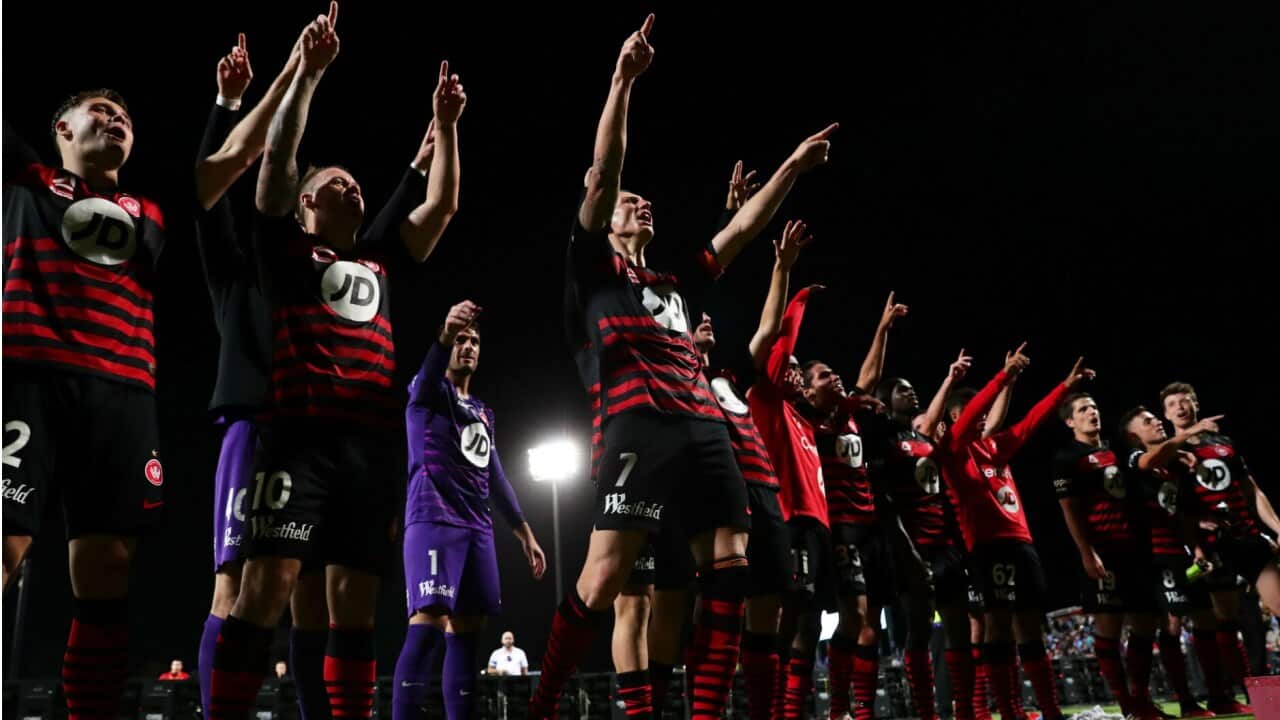 Western Sydney Wanderers celebrate their win over Sydney FC in the recent derby.