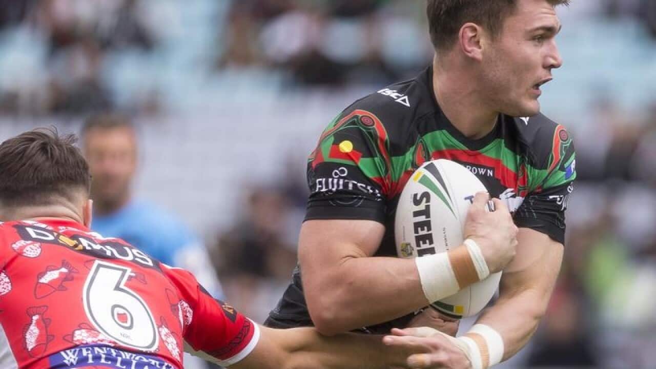 Angus Crichton of the Rabbitohs in action against the Dragons.