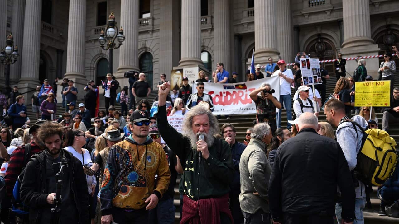 Those against a Voice to Parliament gather outside Victoria's Parliament House.