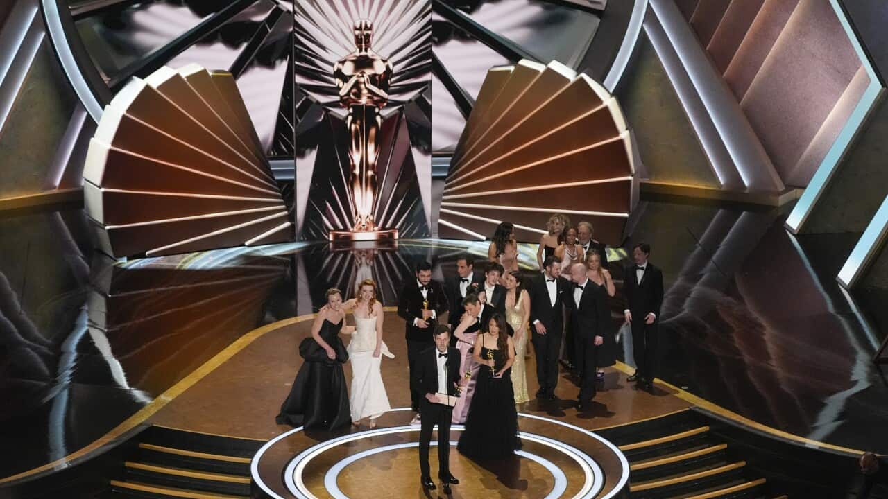 Anora team on stage at the Oscars