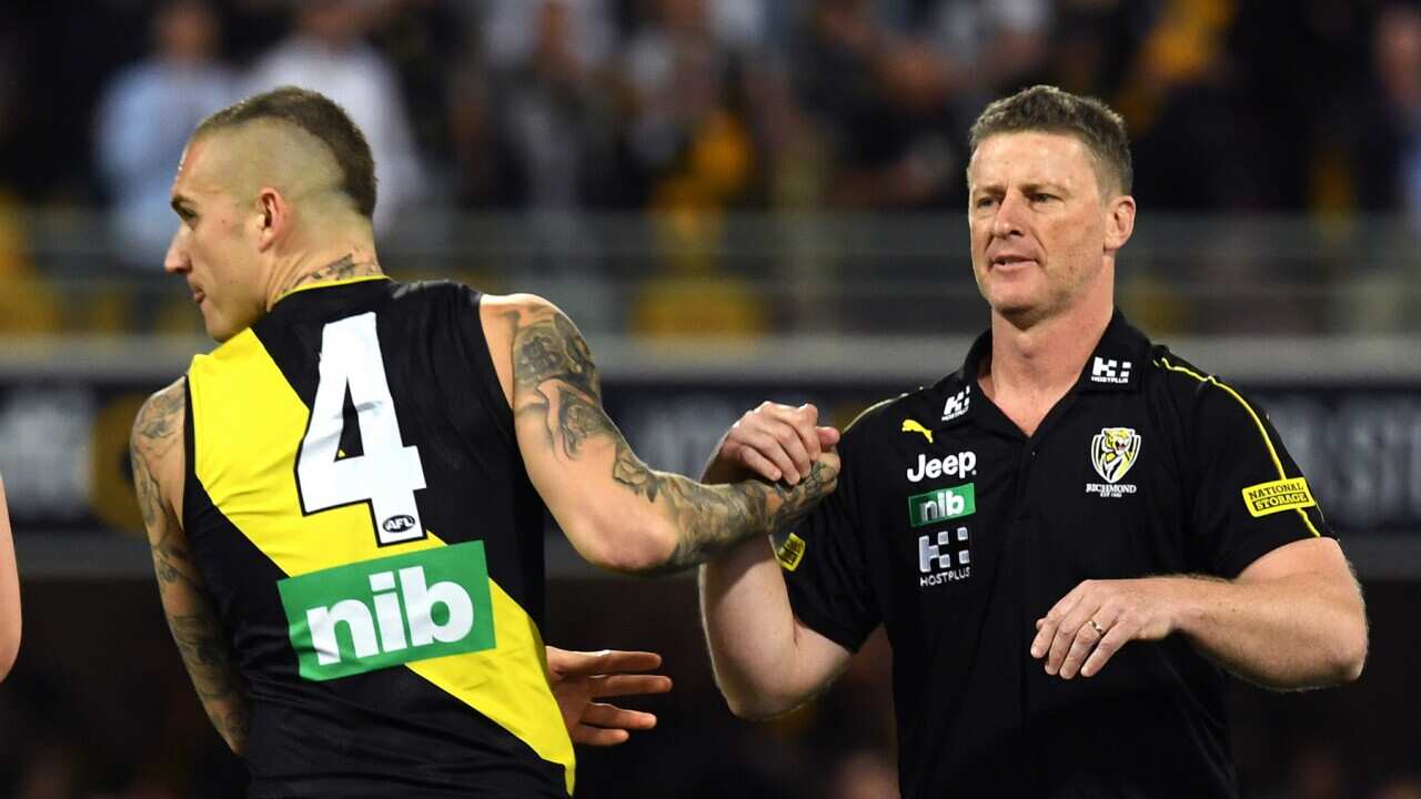 Tigers coach Damien Hardwick (right) reacts with Dustin Martin during the Second Qualifying Final between the Brisbane Lions and the Richmond Tigers
