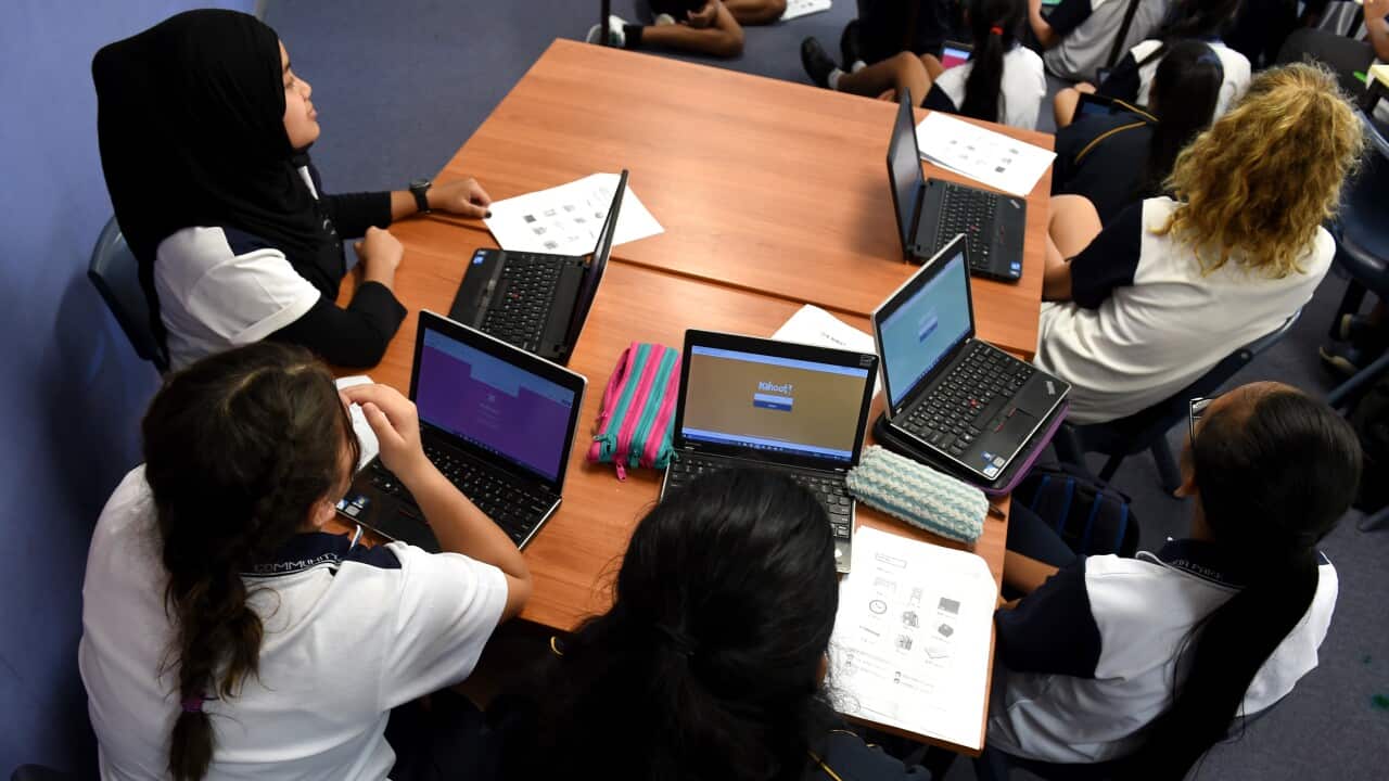 Students attend a class at Alexandria Park Community School in Sydney on Wednesday, May 4, 2016. (AAP Image/Paul Miller) NO ARCHIVING