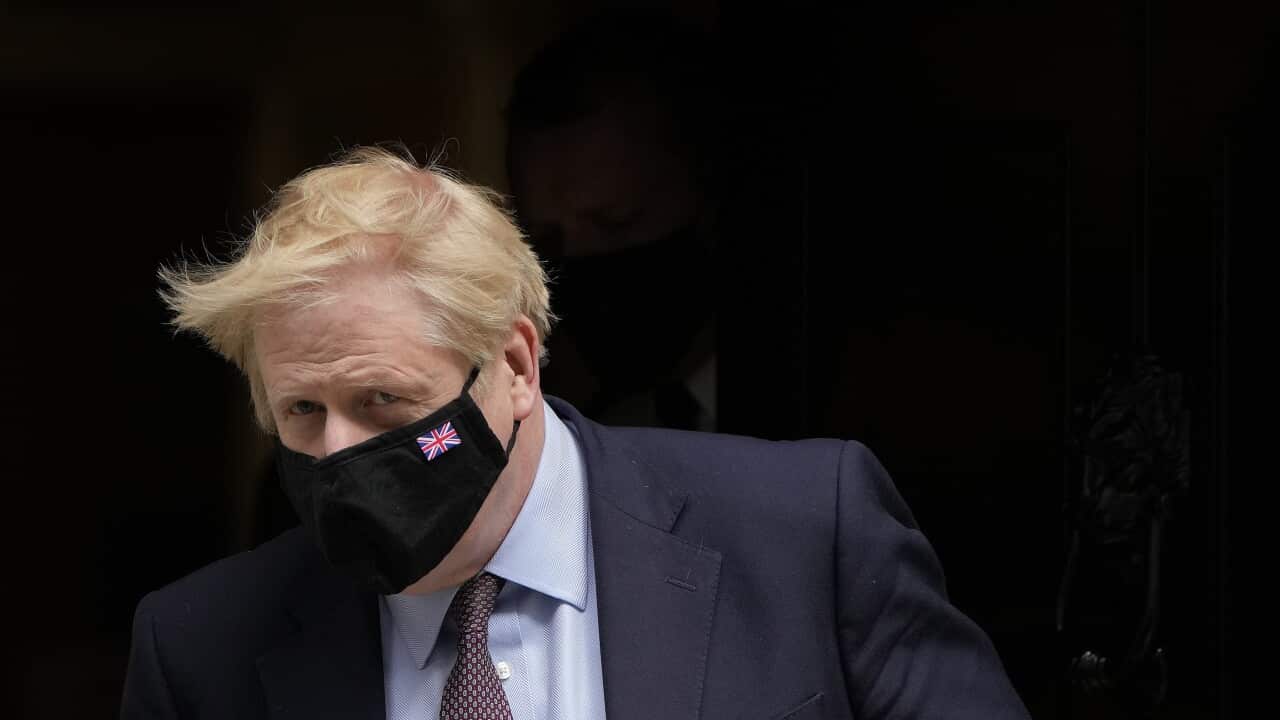 Britain's Prime Minister Boris Johnson leaves 10 Downing Street on Wednesday.