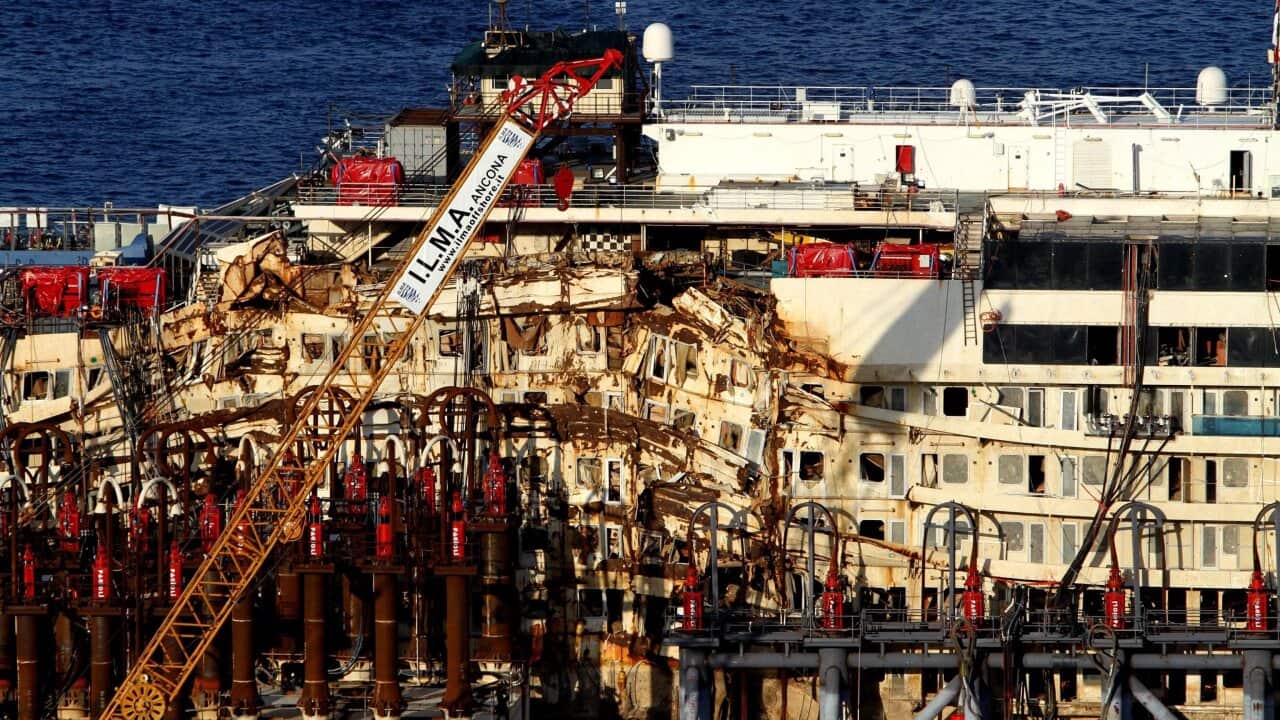 A view of the ongoing works to refloat the wreck of the Costa Concordia cruise ship off the coast of Giglio Island, Italy, 19 July 2014. (EPA)