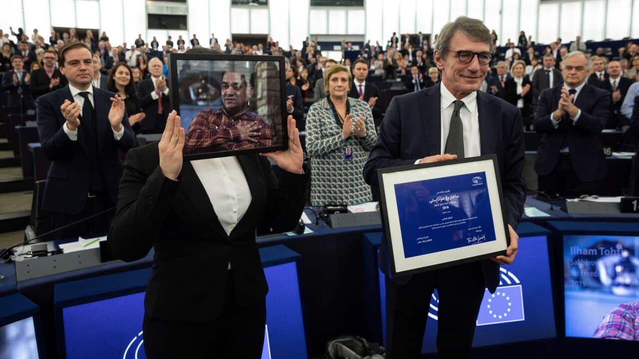 Jewher Ilham, daughter of imprisoned Uighur scholar Ilham Tohti and European Parliament President David Sassoli attend the Sakharov Prize ceremony.